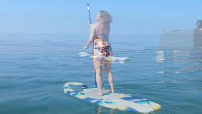 Stepmother enjoys paddle boarding and puss banging