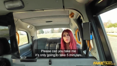 Thick redhead is getting schlonged in the fake taxi