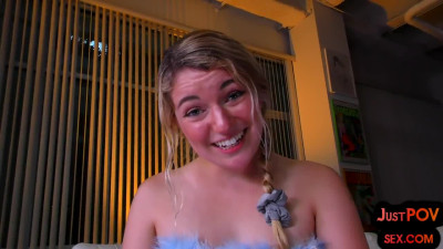 Busty blonde is looking at you while riding in point of view