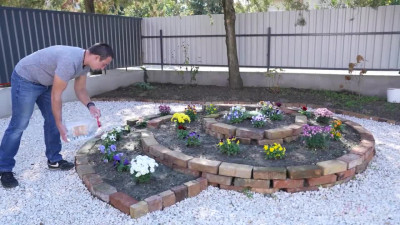 Busty GILF is giving a blowjob to a dude in the kitchen