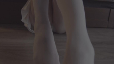 A couple of women are having a party with a naked dancer