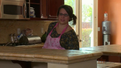Nerdy housewife rubs hairy pussy in the kitchen
