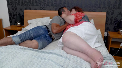 Mature redhead is making out and getting fingered too