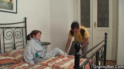 Old woman is anally fucked in doggystyle