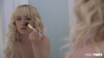 Man gets it on with blonde girl in the bathroom