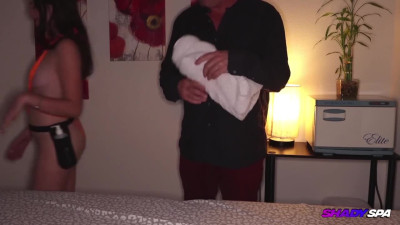 Gorgeous brunette gives a massage and a handjob to a BWC