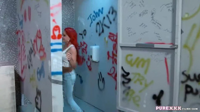 Redheaded inked hottie getting frocked in the toilets