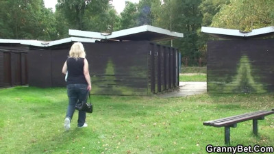 Public blowjob for a skinny dude by a busty blonde