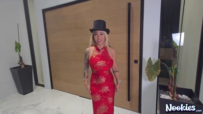 Asian blonde with tattoos is celebrating the Lunar New Year