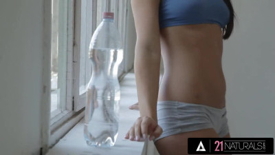 Young girl with amazing boobs is fucked in an empty room