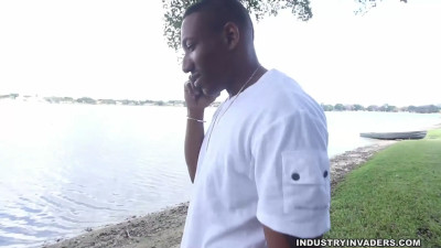 Esmi Lee is outdoors and she gives a sloppy blowjob
