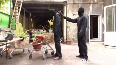 Masked man is trying to hurt the submissive blonde MILF