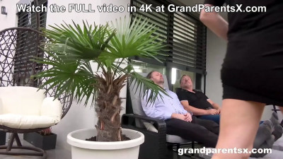 An experienced chick and a pigtailed teen take on a cock