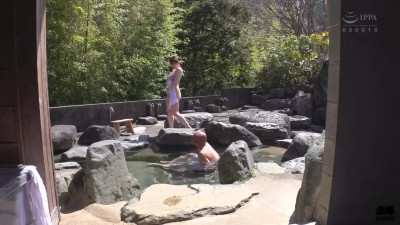 Jun Suehiro gives a handjob in a bath to a bald man