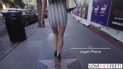 Silvia Saige lets Logan Pierce play with her feet