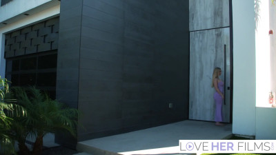 Katalina Kyle gives a footjob to a tall, bald dude