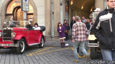 Redheaded mature woman is picked up for a bang